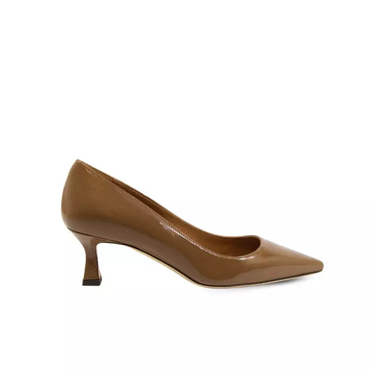 Patent leather pumps with pointed toe and spool heel